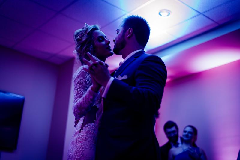 A newly married couple dancing.